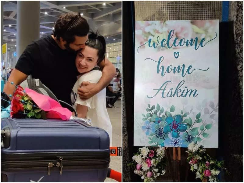 Melis with his fiance at the airport