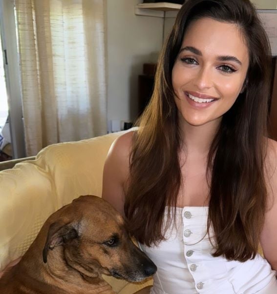 Mia le Roux with pet dog Tintin