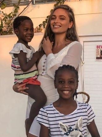 Mia le Roux with the children she took care