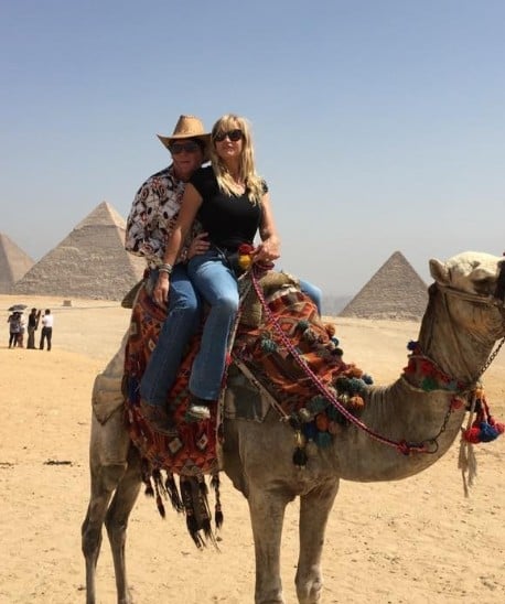 Michael Madsen while riding a camel during a trip