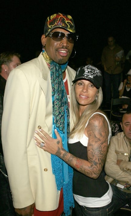 Michelle Moyer and Dennis Rodman at the Christian Audigier Fall 2007 fashion show
