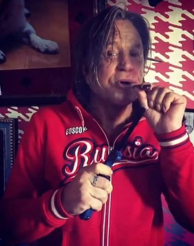 Mickey Rourke smoking a cigar