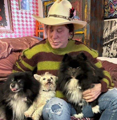 Mickey Rourke with his pet dogs