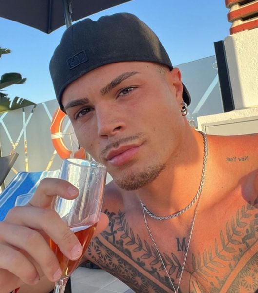 Miguel Martínez drinking wine