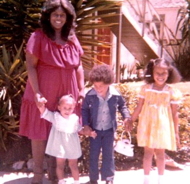 Mikel Ruffinelli as a child wearing a yellow dress taken in 1977 in Los Angeles