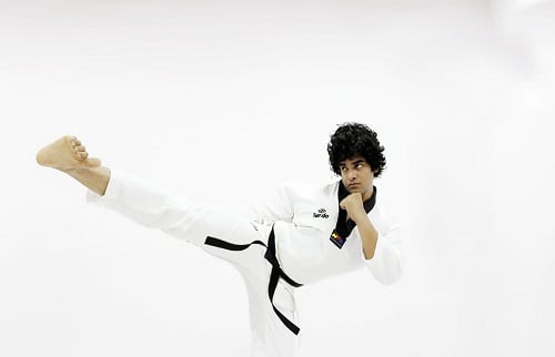 Mikki Koomar in Karate pose