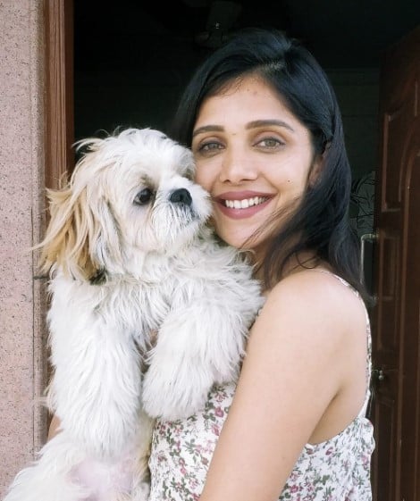 Milana Nagaraj posing with her pet