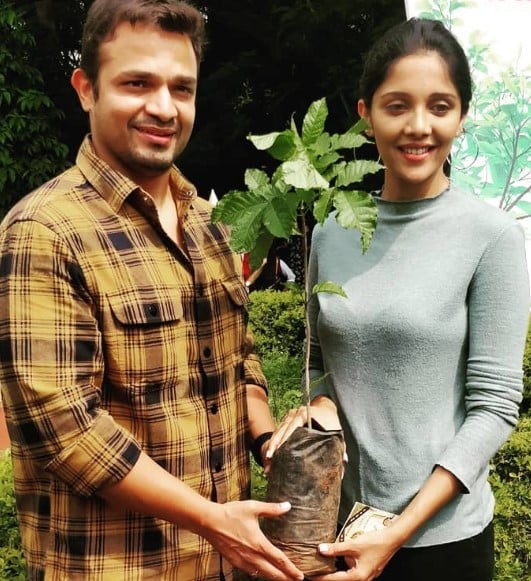 Milana Nagaraj while posing with a sapling in her hand