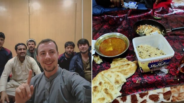 Miles Routledge having snacks with some Talibanis in Afghanistan