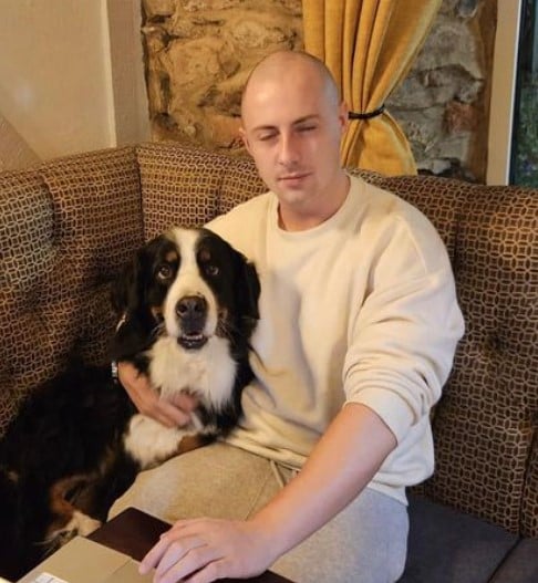 Miles Routledge with his pet dog