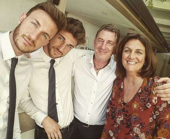 Mileto brothers with their parents during a trip