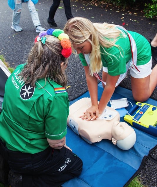 Milla Magee while demonstrating CPR technique
