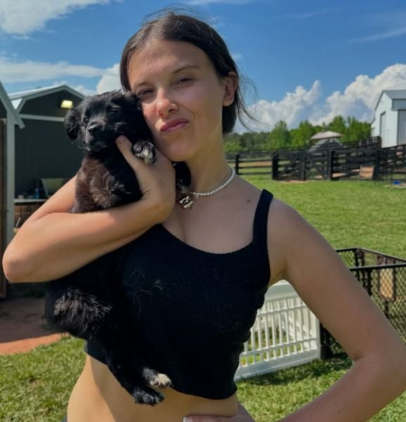 Millie Bobby Brown with one of her pet dogs