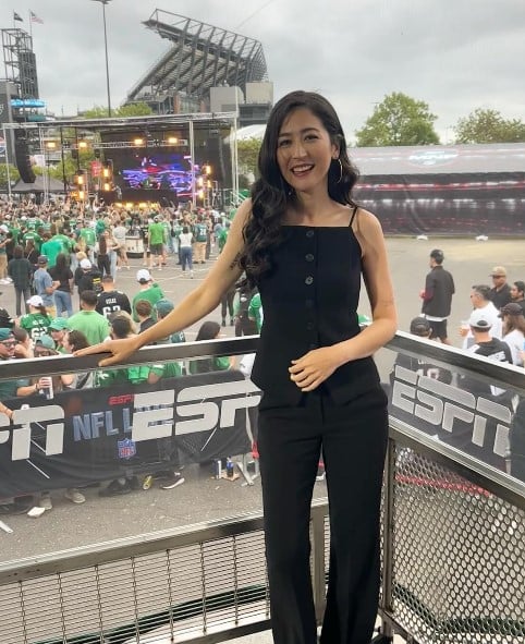 Mina Kimes posing at an NFL stadium