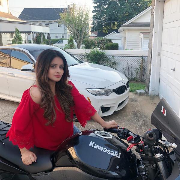 Miss Pooja loves riding bikes