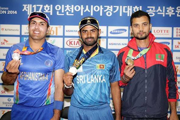 Mohammad Nabi (left) after winning silver at the 2014 Incheon Asian Games
