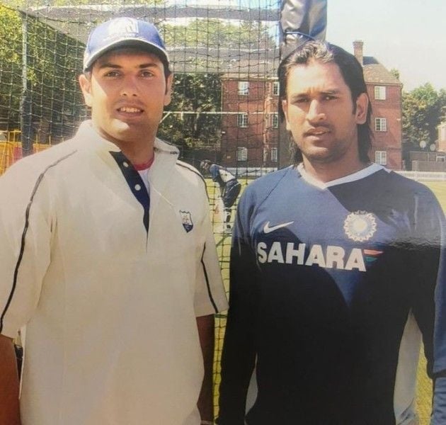 Mohammad Nabi with MS Dhoni during a practice session in India