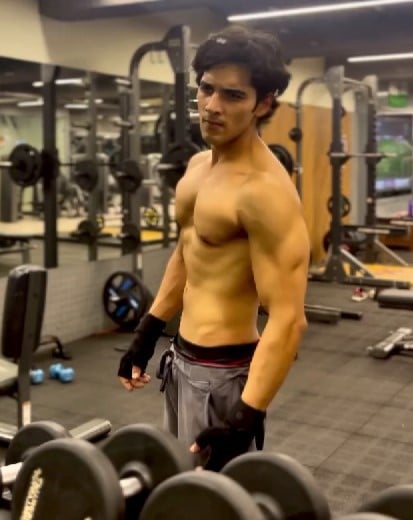Mohit Duseja while posing at a gym