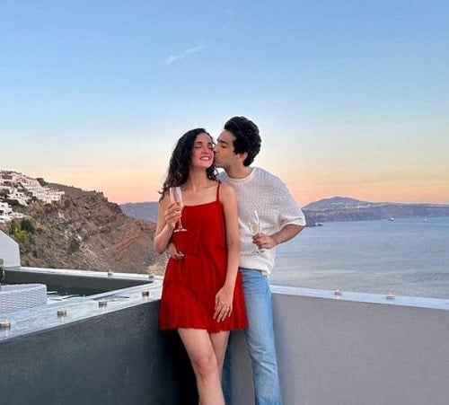 Mohit Sehgal holding a glass of wine