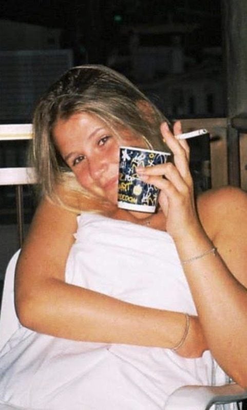 Mollie Pearce while smoking a cigarette