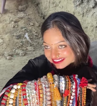 Monalisa Bhosle while posing for the media