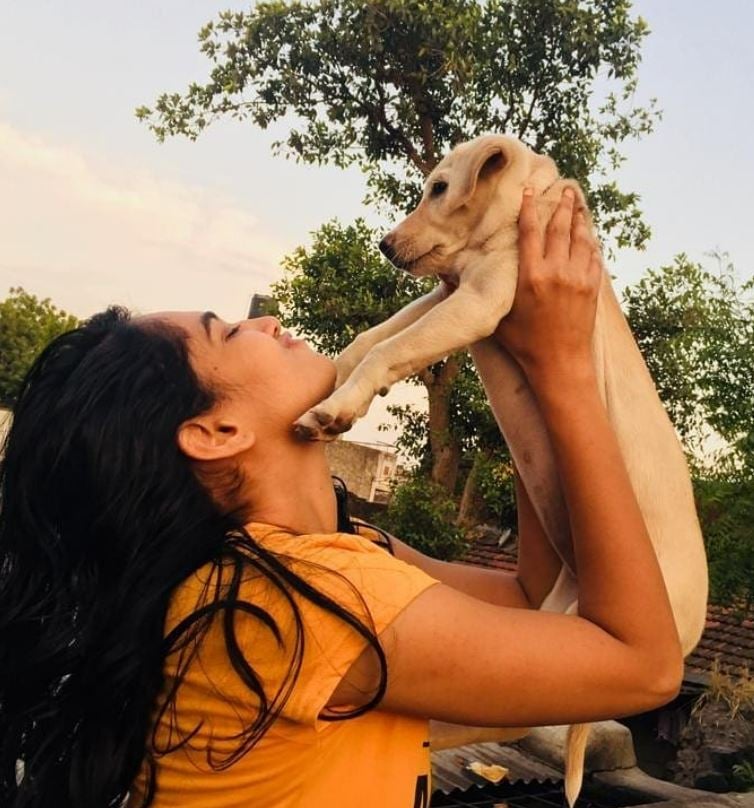Monica Rathi with a dog
