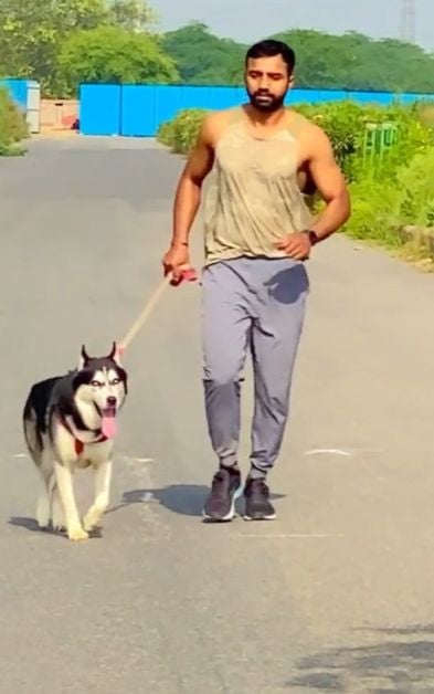 Monu Goyat with his pet dog