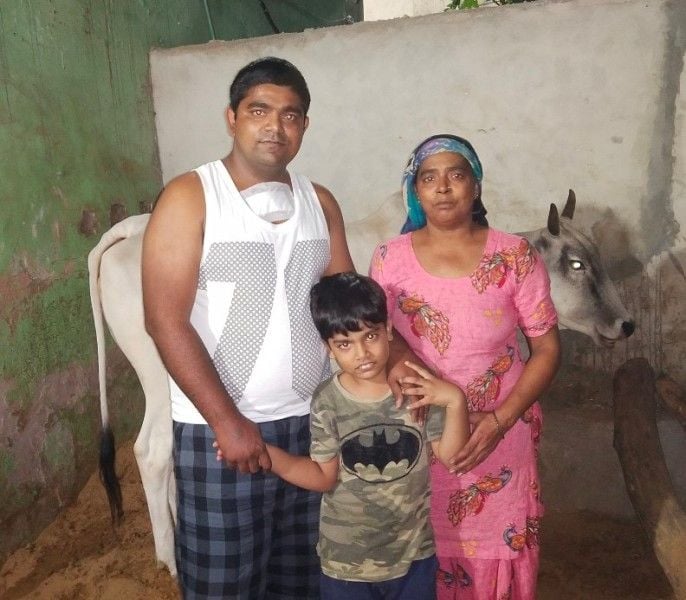 Monu Manesar with his son and mother after coming home from the hospital