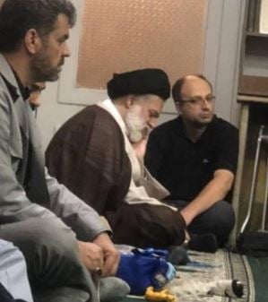 Mostafa Khamenei (second from right) at a religious session in Qom