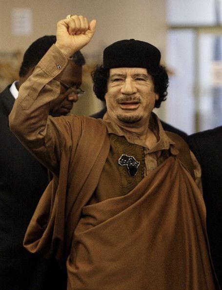 Muammar Gaddafi was helped by Christian Michel