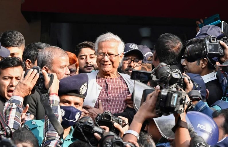 Muhammad Yunus while leaving a court in Dhaka, Bangladesh, on 1 January 2024