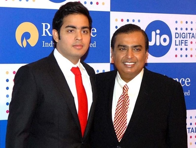 Mukesh and Akash at an event held by Reliance Jio