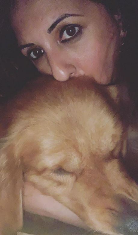 Munisha Khatwani with a dog