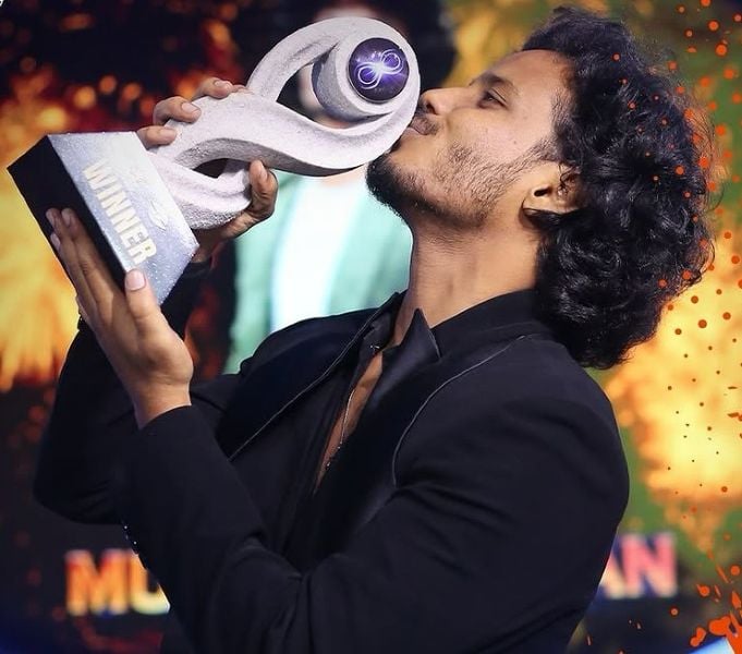 Muthukumaran with his trophy