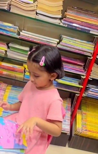 Myra Vaikul reading a book