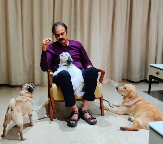 Nagendra Babu with his pet dogs