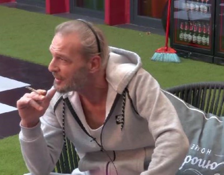 Naim Xuxi Bunjaku smoking a cigarette