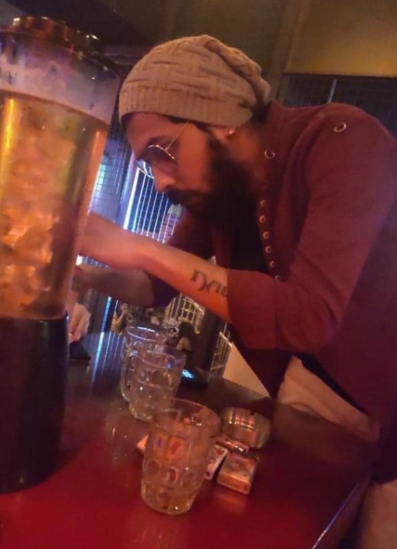 Nalin Yadav consuming alcohol at a party