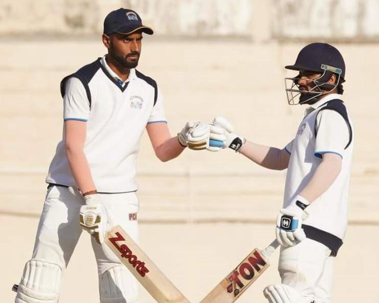 Naman Dhir with Prabhsimran Singh (right) during a Ranji match