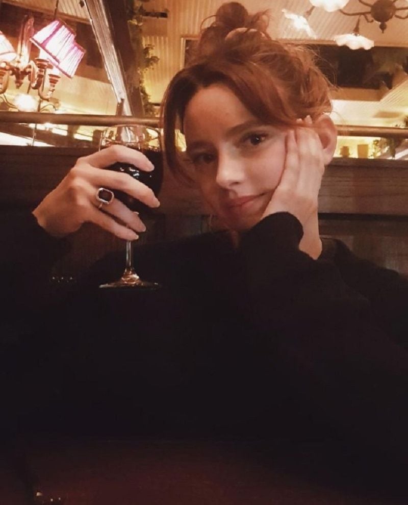 Natasha Bassett drinking wine