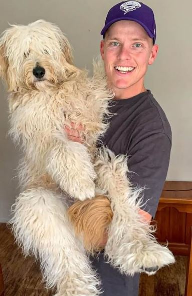 Nathan Ellis with his pet dog