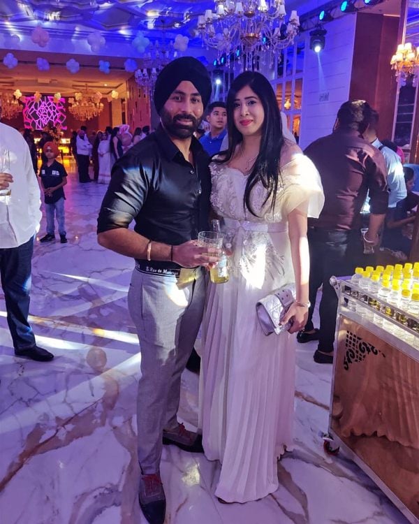Navdeep Khanuja with his wife having drinks