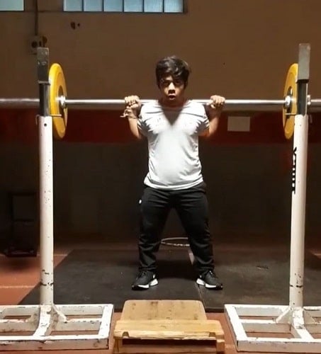 Navdeep Singh practicing weightlifting