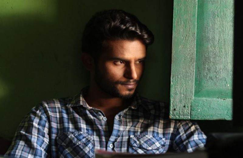 Naveen Shankar as as Ranjit in the Kannada film Hondisi Bareyiri