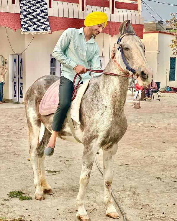 Navjeet riding horse