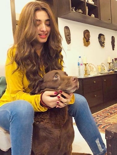 Nawal Saeed with her pet dog