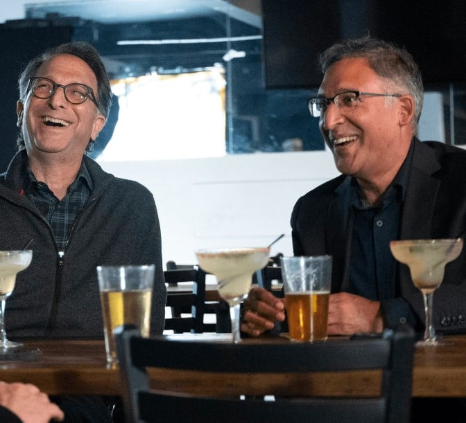 Neal Katyal (right) while enjoying alcohol