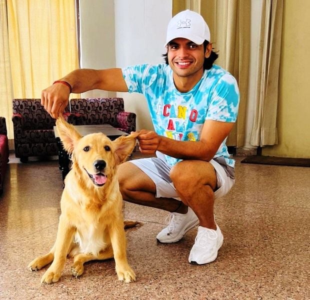 Neeraj Chopra with his pet dog Tokyo