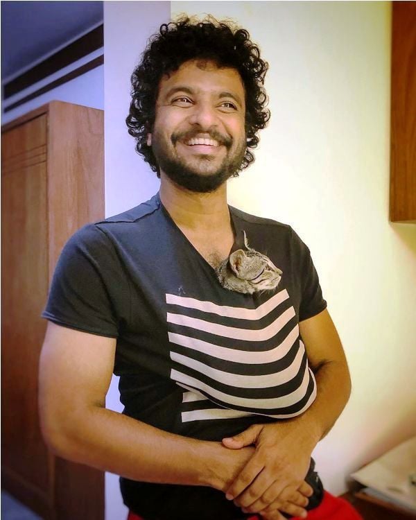 Neeraj Madhav with a Cat