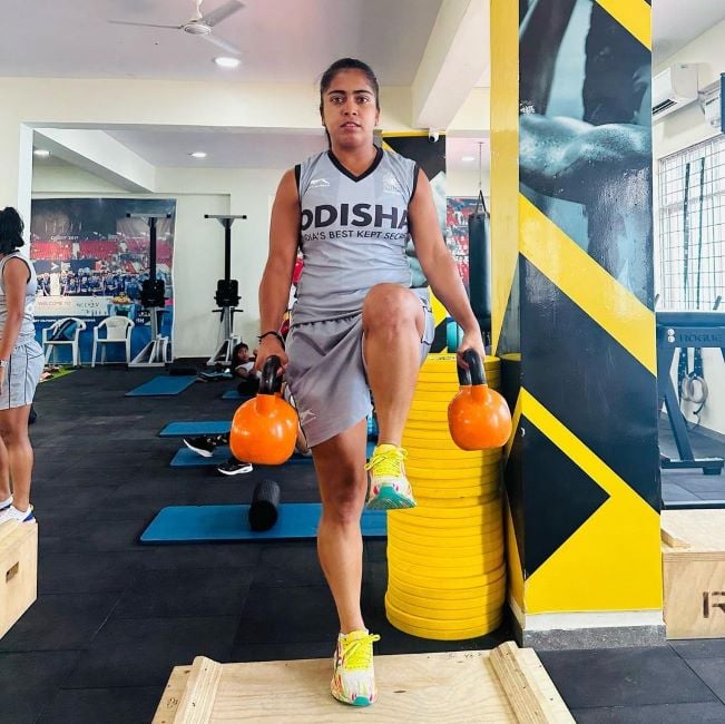 Neha Goyal working out at the gym